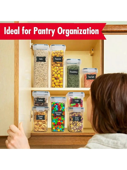 Tailwag Factory 24-piece clear airtight food storage container set organized on pantry shelves with chalkboard labels
