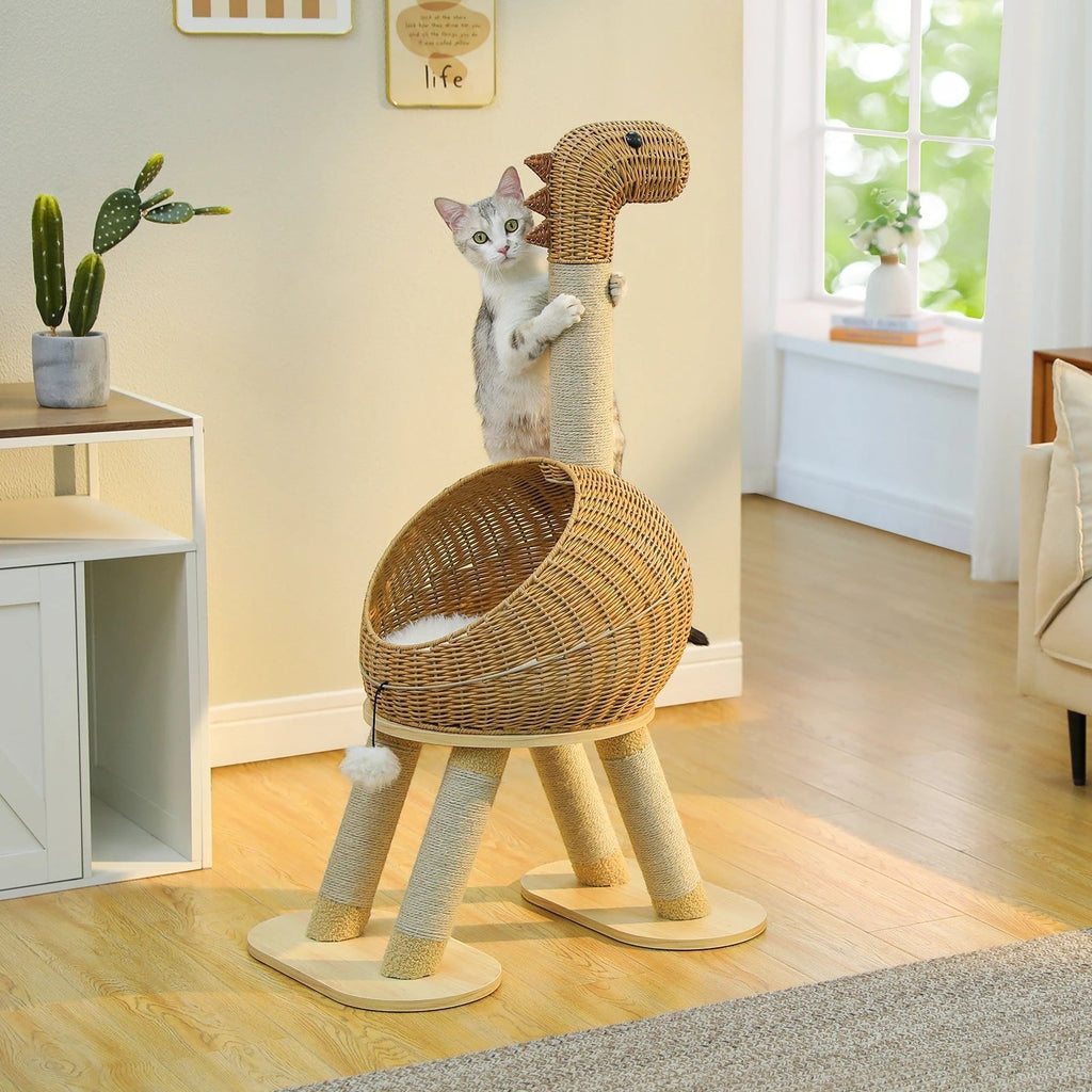 Tailwag Factory dinosaur-shaped cat tree with sisal-wrapped legs and a rattan lounge bed, featuring a cat playing.