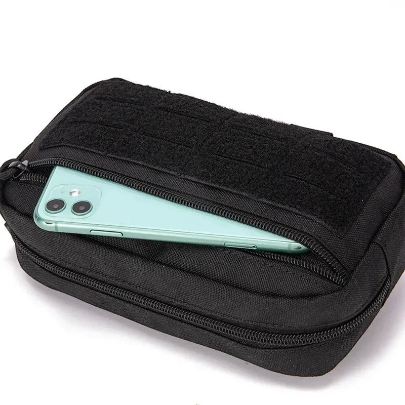 Tailwag Factory Jarhead black tactical MOLLE pouch made of 1000D nylon with a smartphone in the front pocket