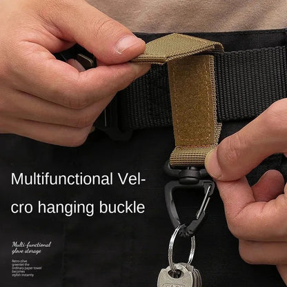 Tailwag Factory khaki nylon MOLLE key hook clip attached to a tactical belt for easy gear access