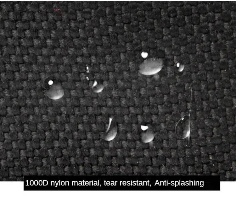 Tailwag Factory black 1000D nylon tactical pouch fabric showing water-resistant beads on the durable textured surface